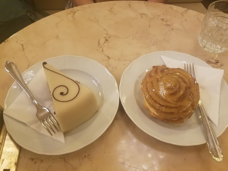 A table with two plates of desserts